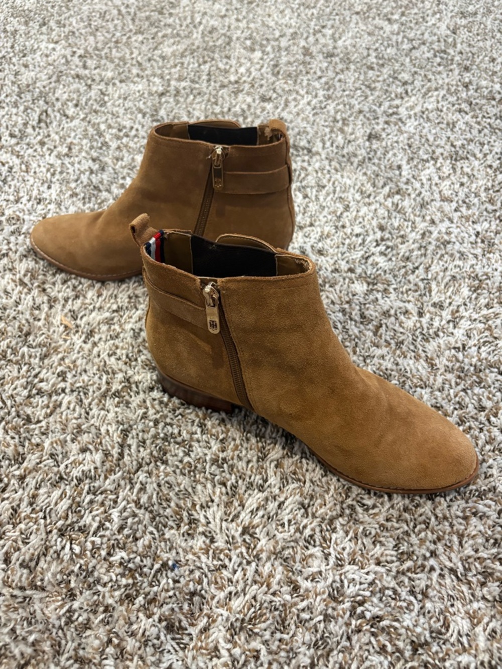 Tommy Hilfiger brown suede ankle boots with a buckle detail and side zipper. 8.5